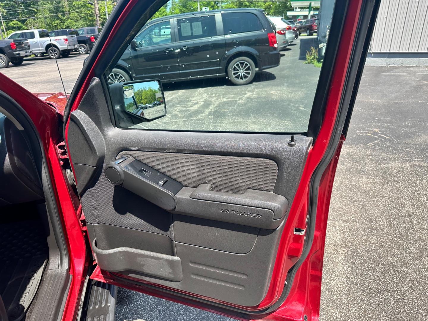 2009 Red /black Ford Explorer XLT (1FMEU73E89U) with an 4.0L V6 engine, 5-Speed Automatic transmission, located at 11115 Chardon Rd. , Chardon, OH, 44024, (440) 214-9705, 41.580246, -81.241943 - This 2009 Ford Explorer is a reliable and capable SUV, offering a 4.0L V6 engine paired with a 5-speed automatic transmission and full-time 4WD system. With a 3,500-pound towing capacity, it's suitable for moderate hauling needs. Additionally, the power driver's seat provides comfort and convenience - Photo#41